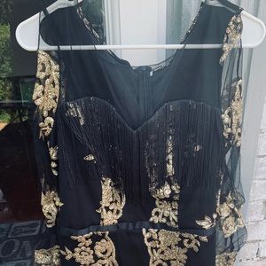 Elegant, beautiful black and gown. Never worn.